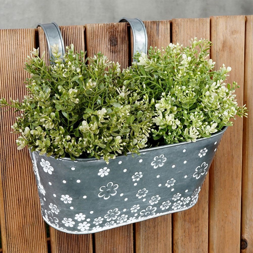Hanging pot in galvanized metal with white flowers for balcony