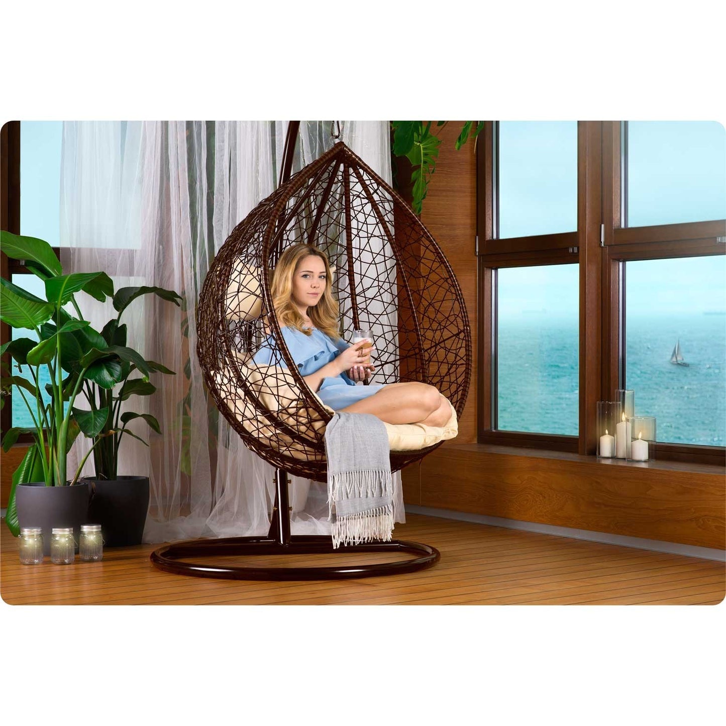 Havana brown hanging rocking garden chair + cream cushions