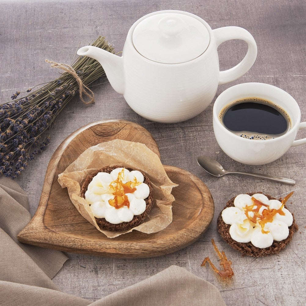 Heart-shaped serving tray in sustainable mango wood