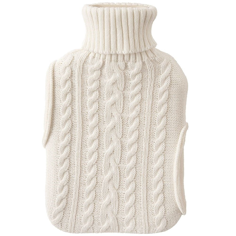 Heating bottle with cozy knitted beige cover