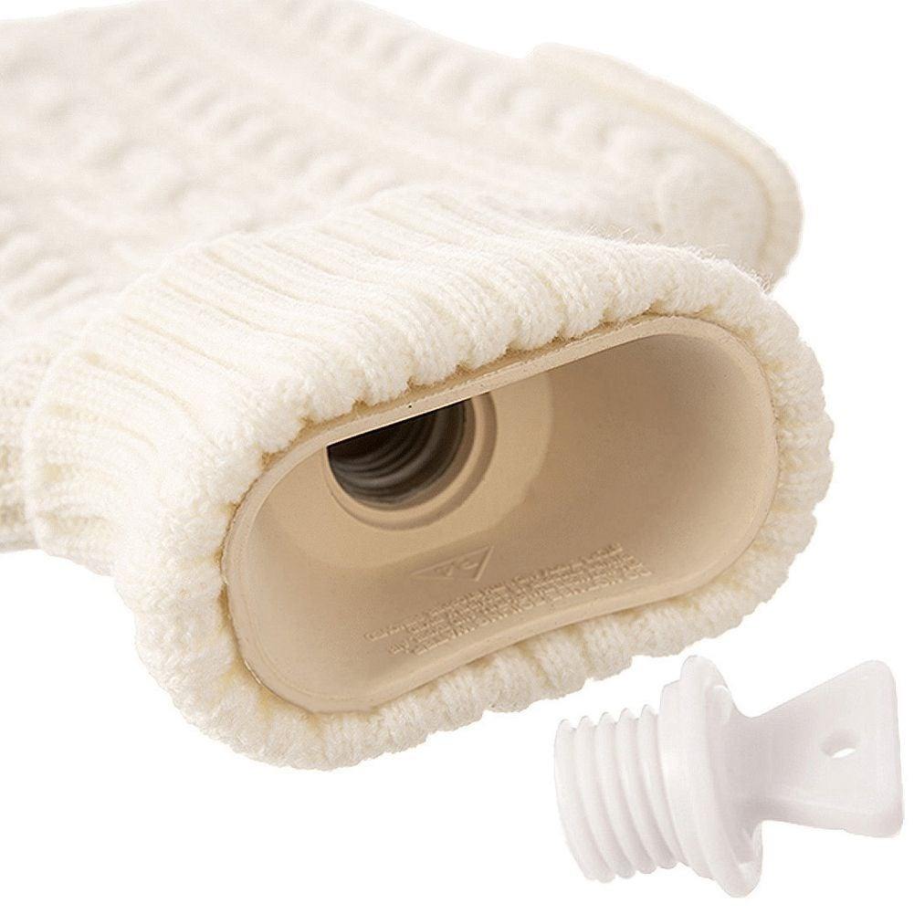 Heating bottle with cozy knitted beige cover