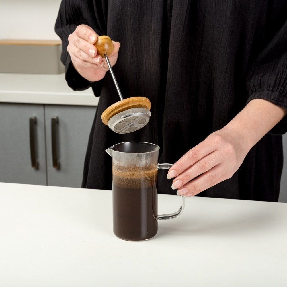 Heat-resistant glass coffee press with steel press and milk frother
