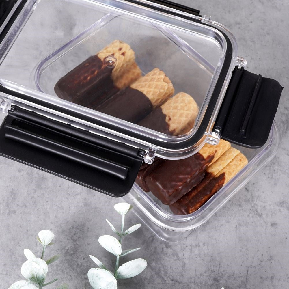 Hermetically sealed food box with rubber seal and four clips