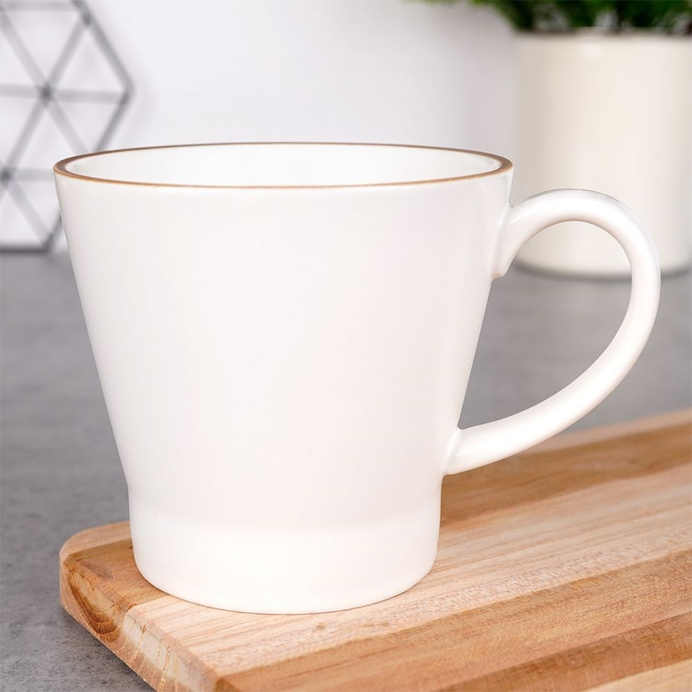High Quality Porcelain Cup - Dishwasher & Microwave SafeThis coffee cup is perfect for enjoying coffee, tea and other beverages. Made of high-quality white porcelain and equipped with a comfortable handle. The cup is both dishwasher and microwave safe