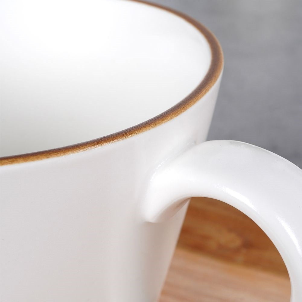 High Quality Porcelain Cup - Dishwasher & Microwave SafeThis coffee cup is perfect for enjoying coffee, tea and other beverages. Made of high-quality white porcelain and equipped with a comfortable handle. The cup is both dishwasher and microwave safe