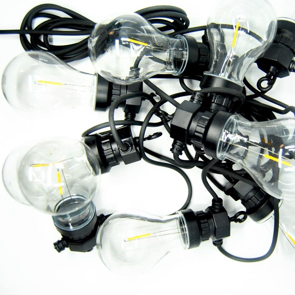 Indoor and outdoor garland with warm light bulbs