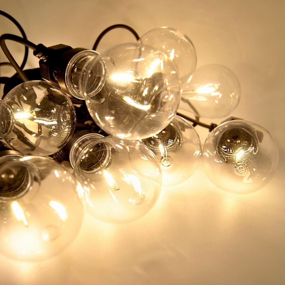 Indoor and outdoor garland with warm light bulbs