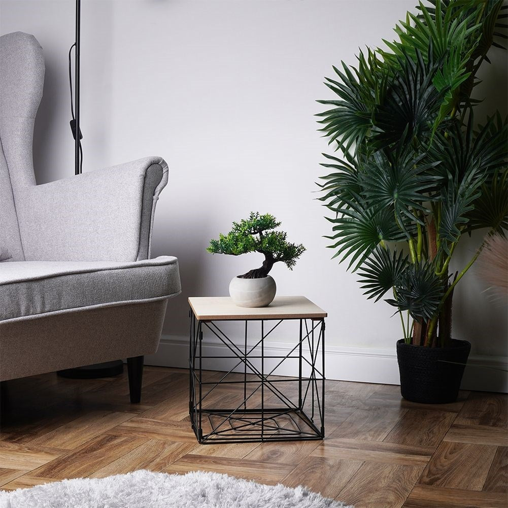 Industrial coffee table with black metal and storage basket