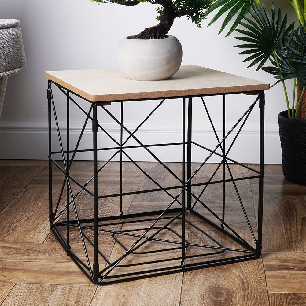Industrial coffee table with black metal and storage basket
