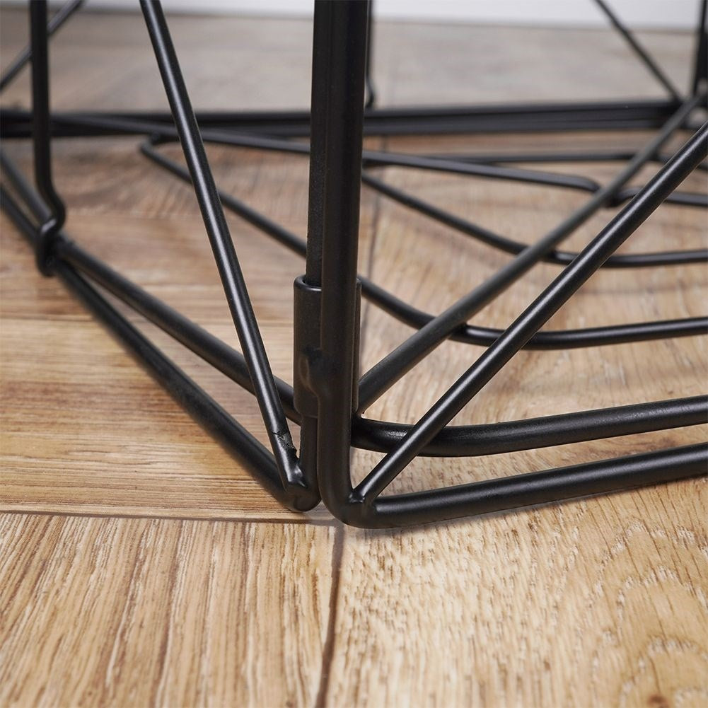 Industrial coffee table with black metal and storage basket