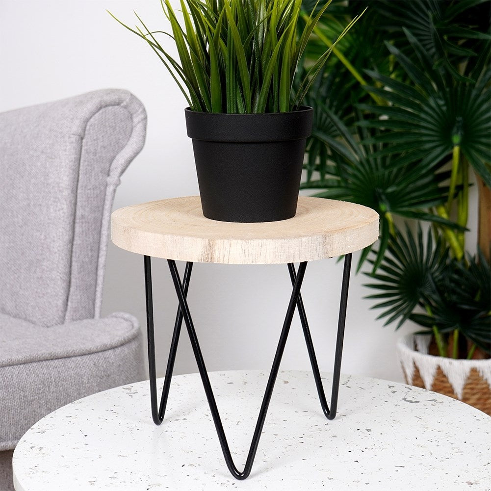 Industrial flower stand in wood and black metal for the home.