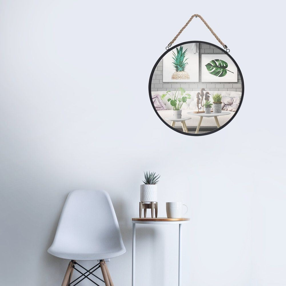 Industrial mirror with black metal frame and rope detail