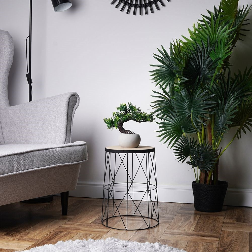 Industrial style coffee table in loft design with black metal base