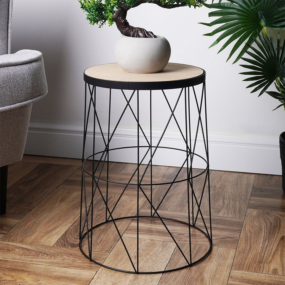Industrial style coffee table in loft design with black metal base