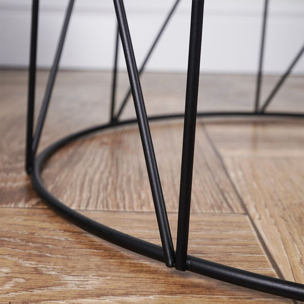 Industrial style coffee table in loft design with black metal base