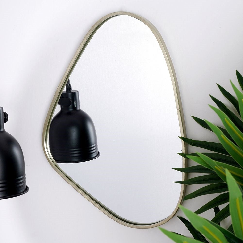 Irregular wall mirror with champagne gold frame