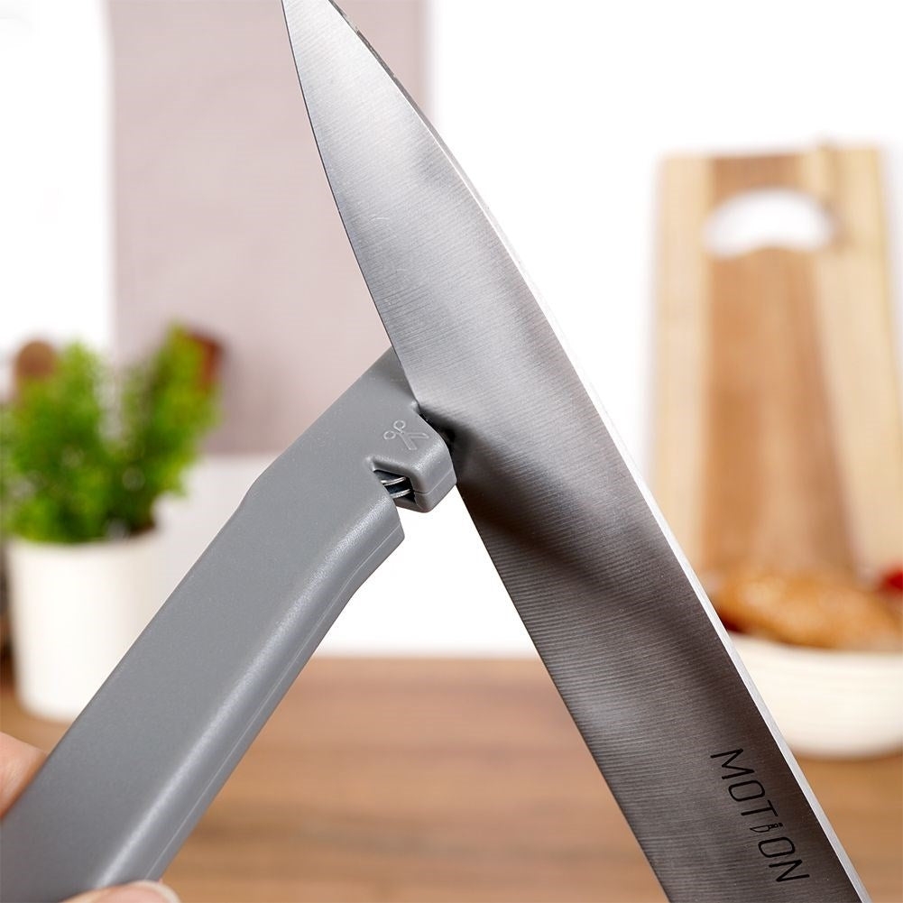 Knife and scissor sharpener with extra sharpening stone in stainless steel