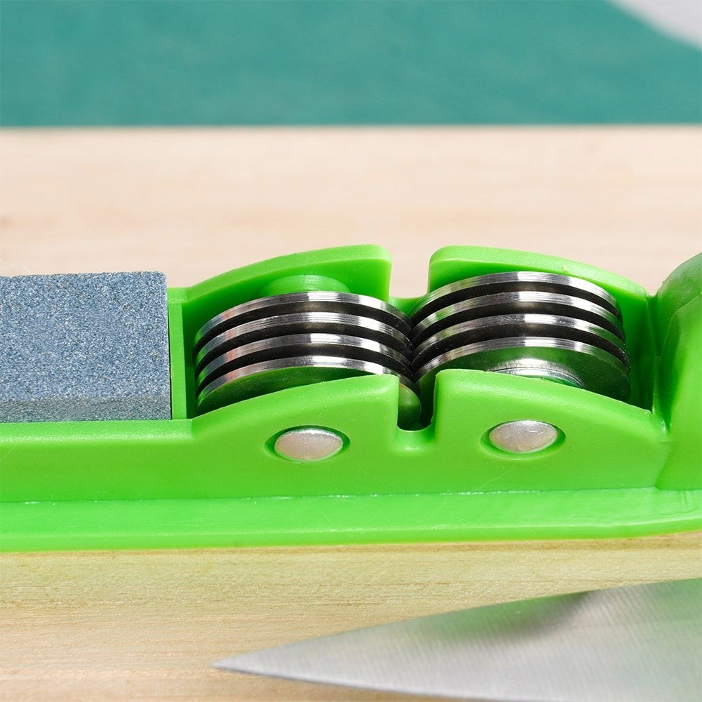 Knife sharpener for stainless steel knives with whetstone and metal rollers