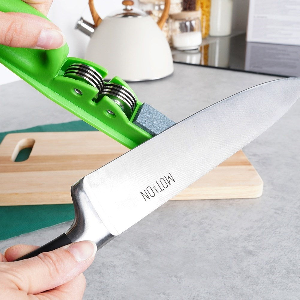Knife sharpener for stainless steel knives with whetstone and metal rollers