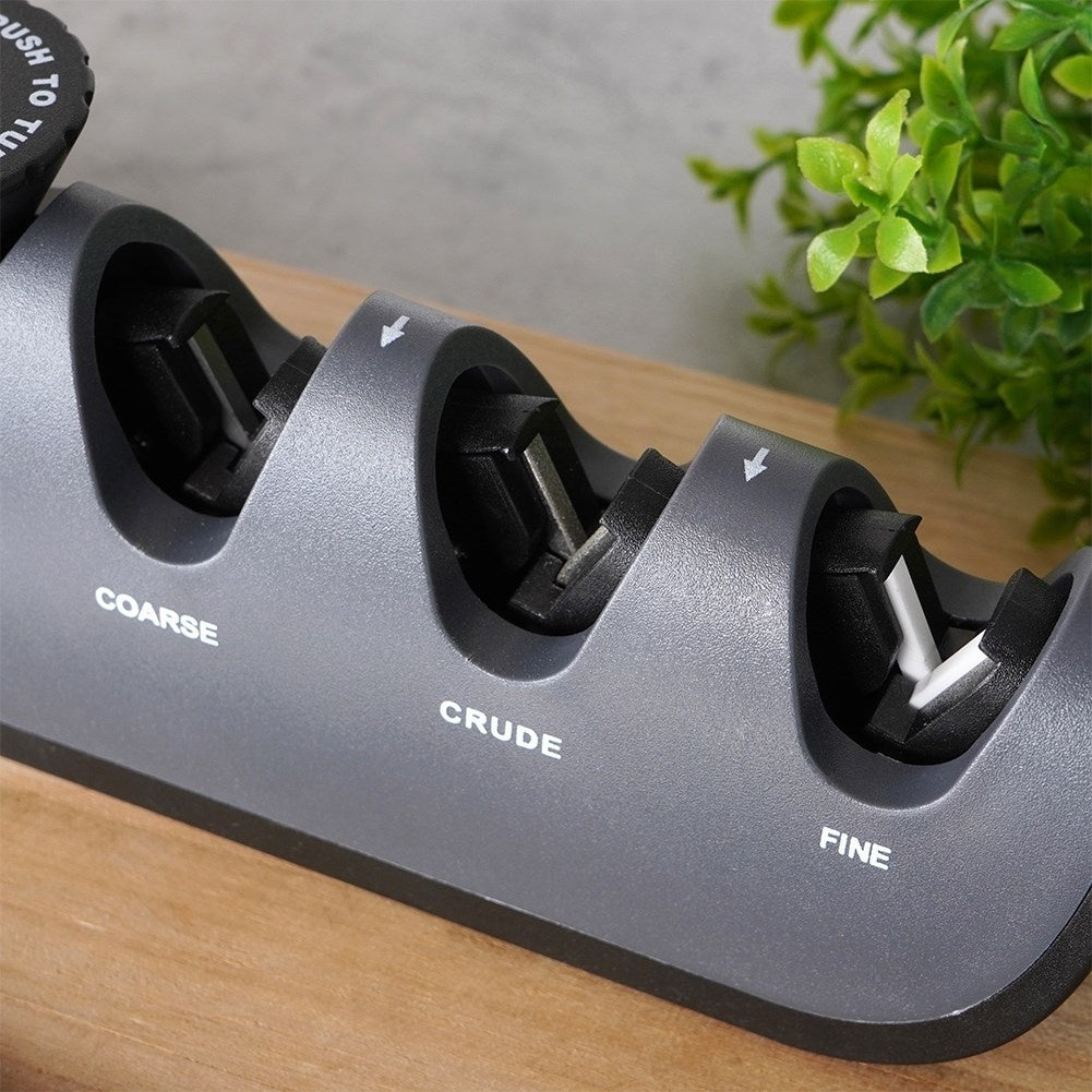 Knife sharpener with four sharpening zones and adjustable sharpening angle