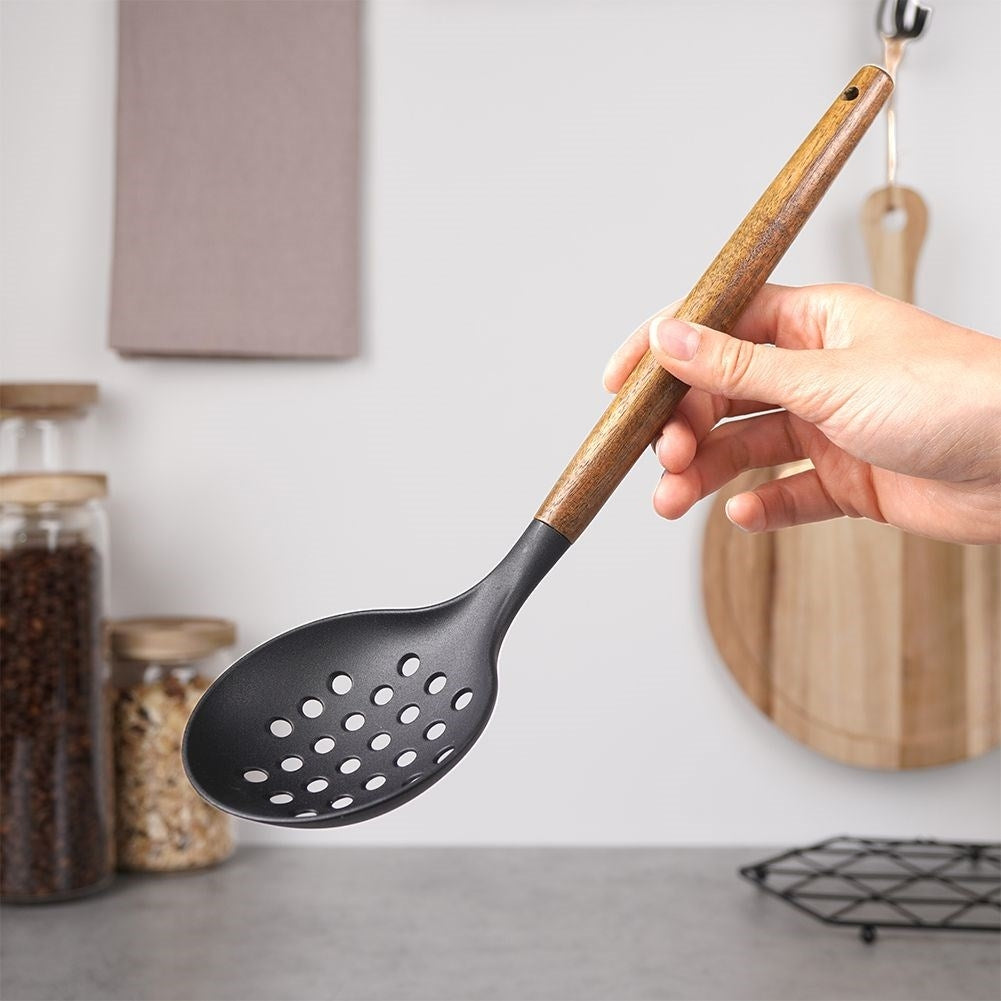 Ladle in durable acacia wood for easy skimming and serving