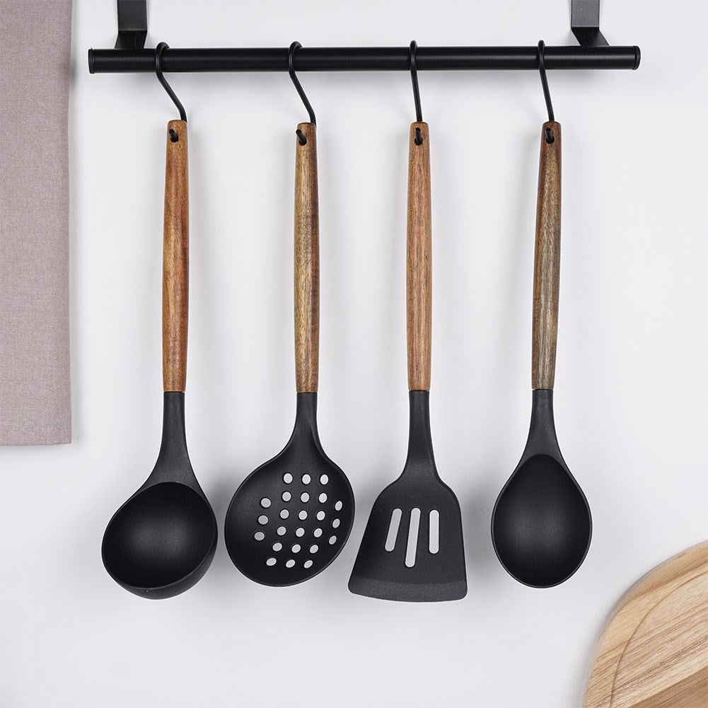 Ladle in durable acacia wood for easy skimming and serving