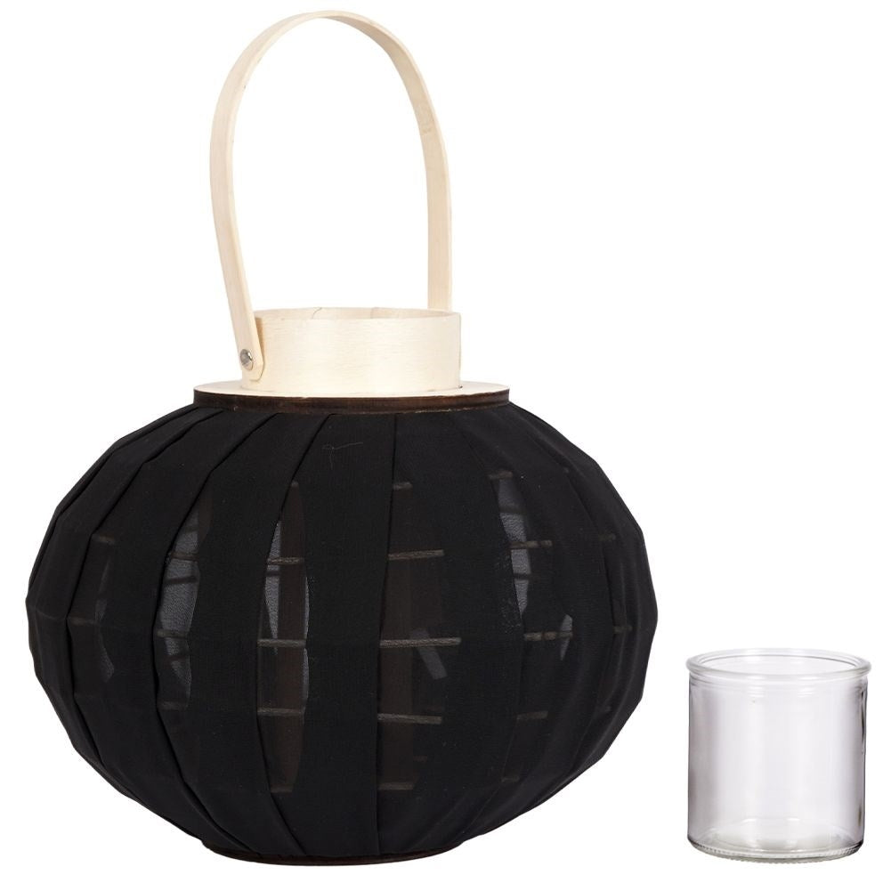 Lantern on a wooden stand with black fabric and glass inlay