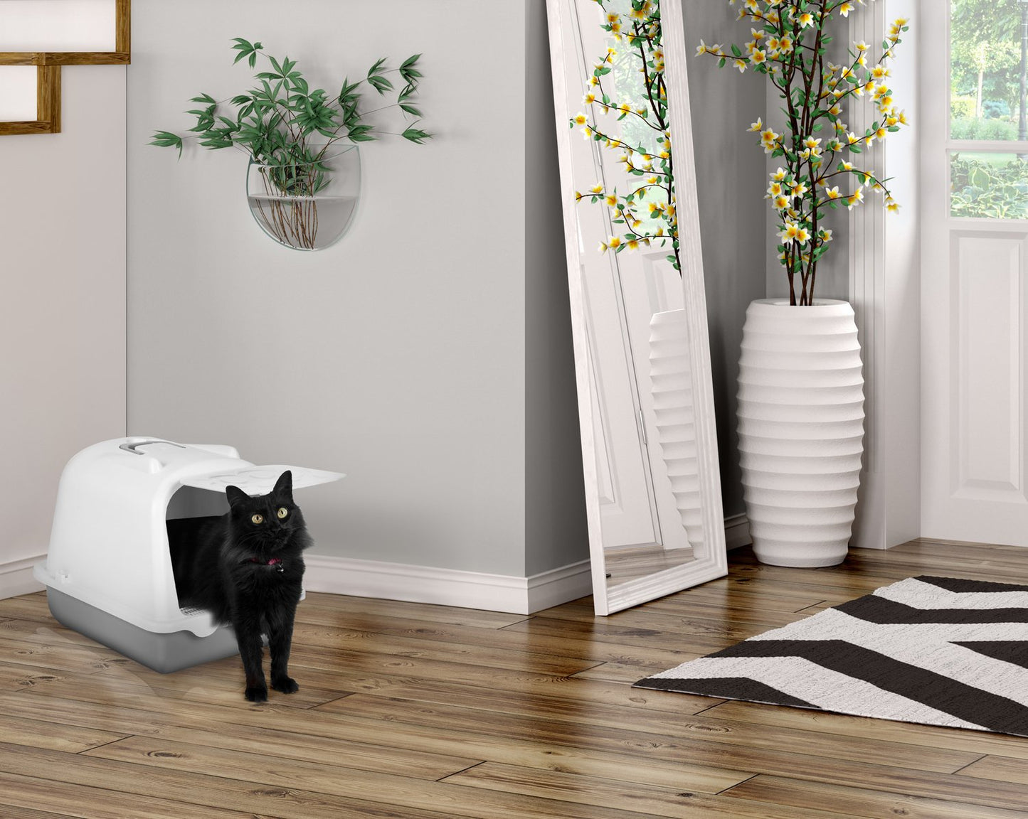 Large closed litter box with a door and a litter scoop