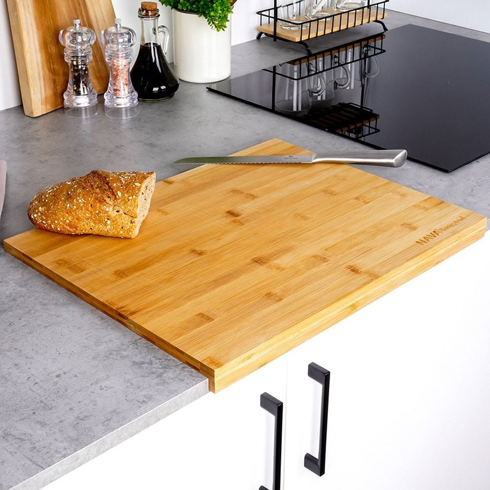 Large cutting board in durable bamboo with edge