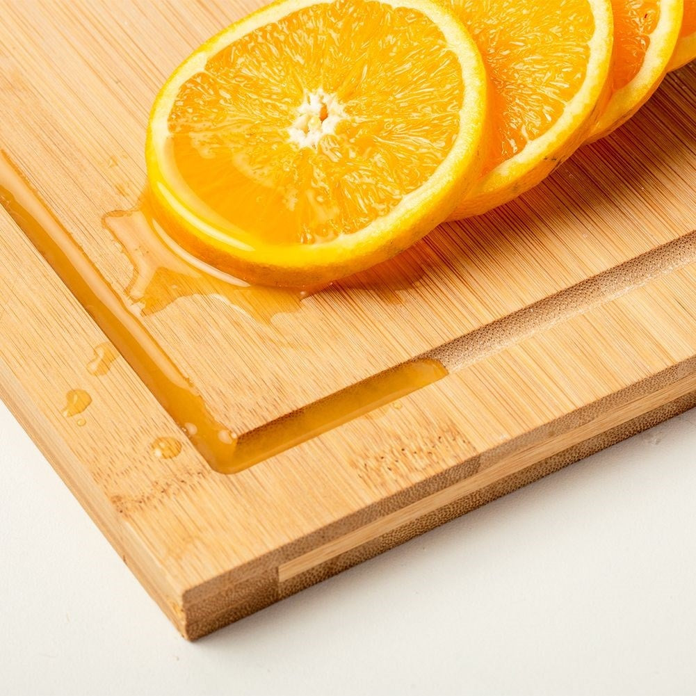 Large cutting board in durable bamboo with edge