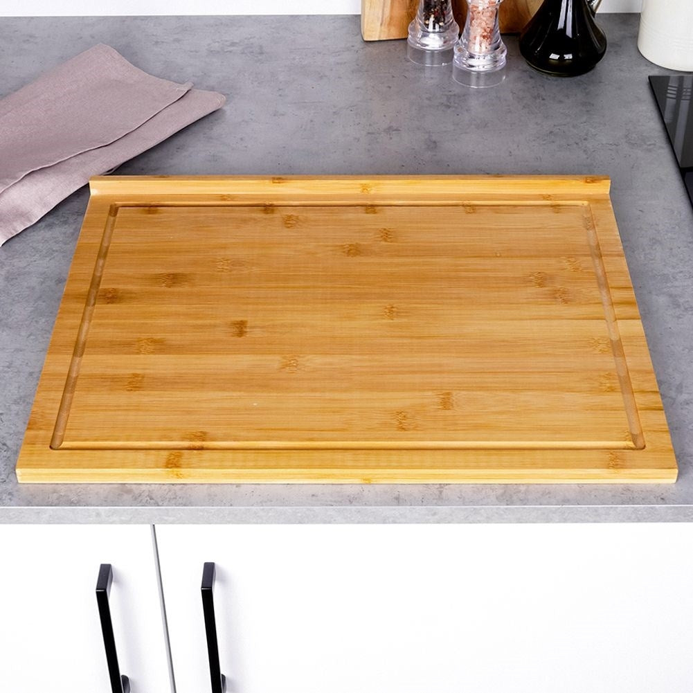 Large cutting board in durable bamboo with edge