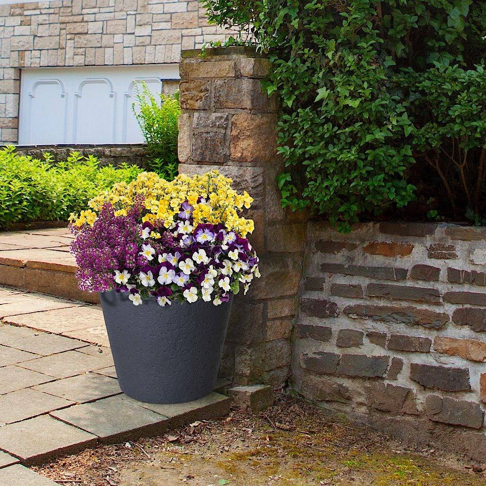 Large flower pot in weather-resistant plastic that imitates stone