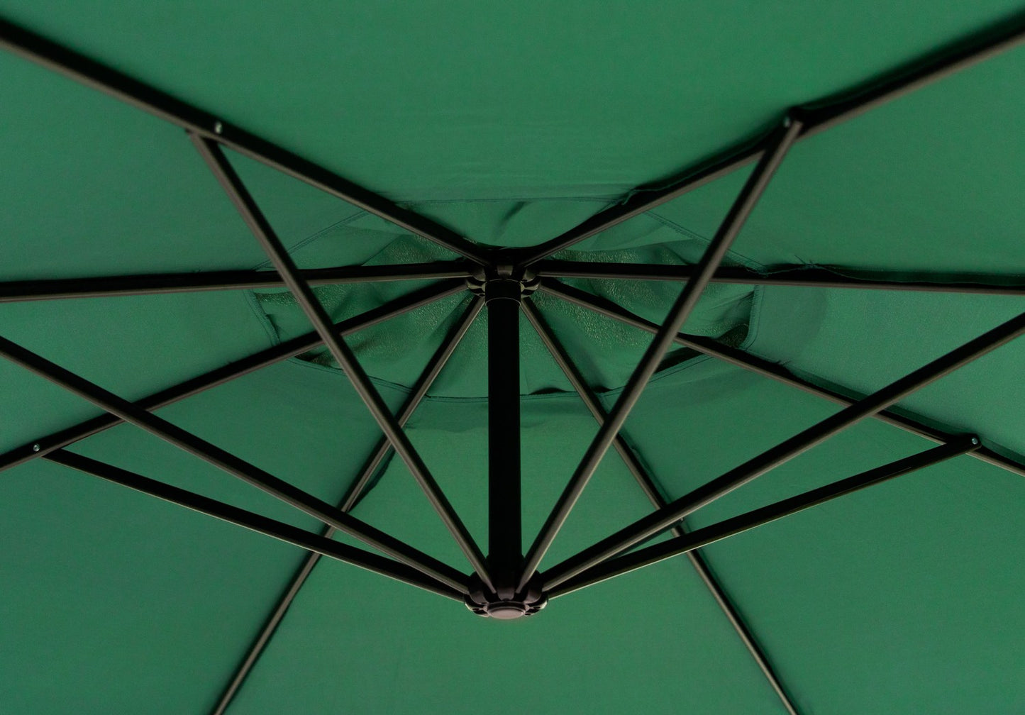 Large garden umbrella on a folding arm, 3.5 m, green