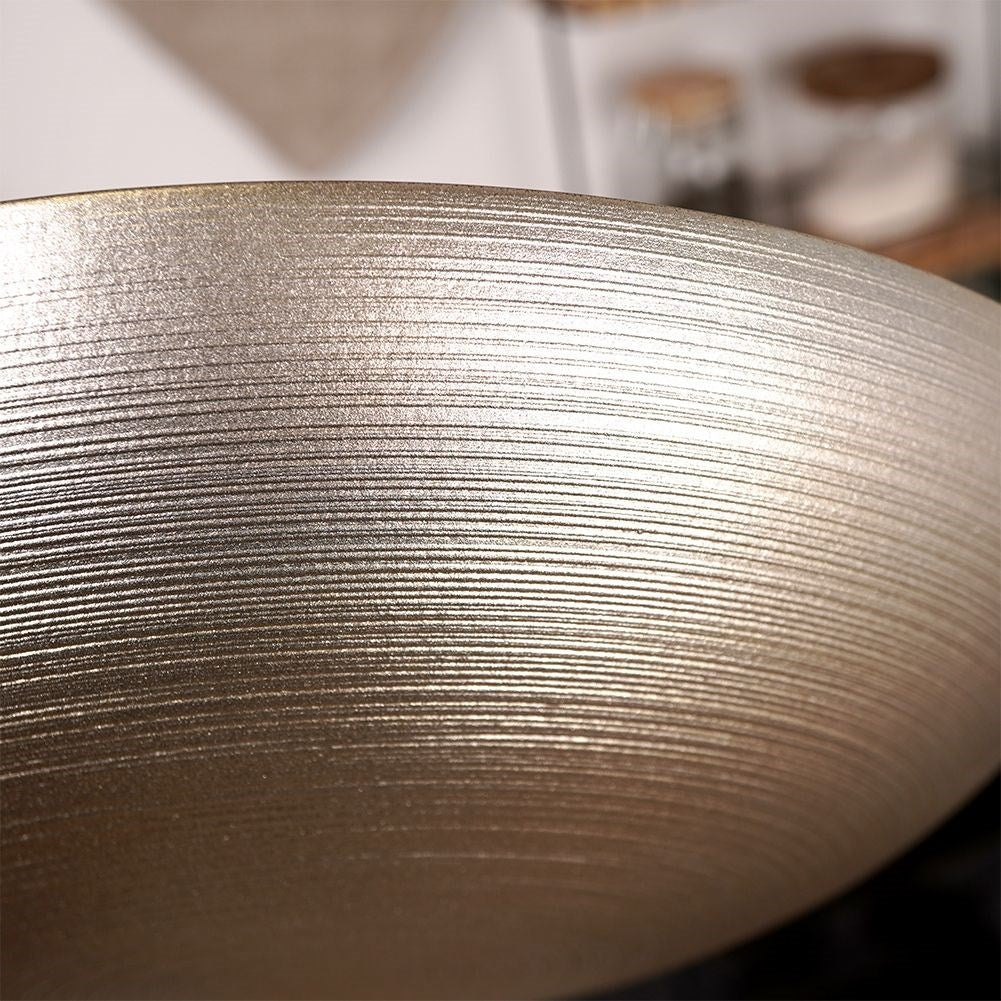 Large golden glass bowl for salad and serving