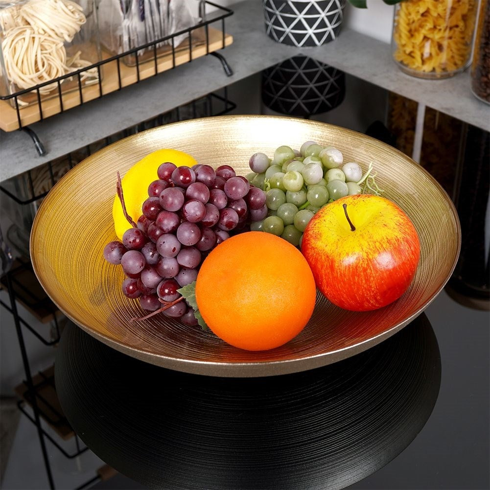 Large golden glass bowl for salad and serving