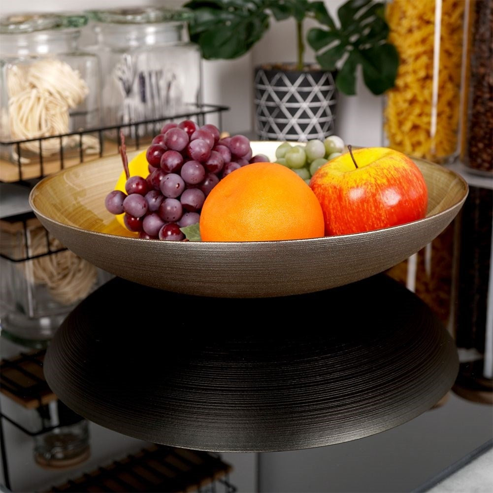 Large golden glass bowl for salad and serving