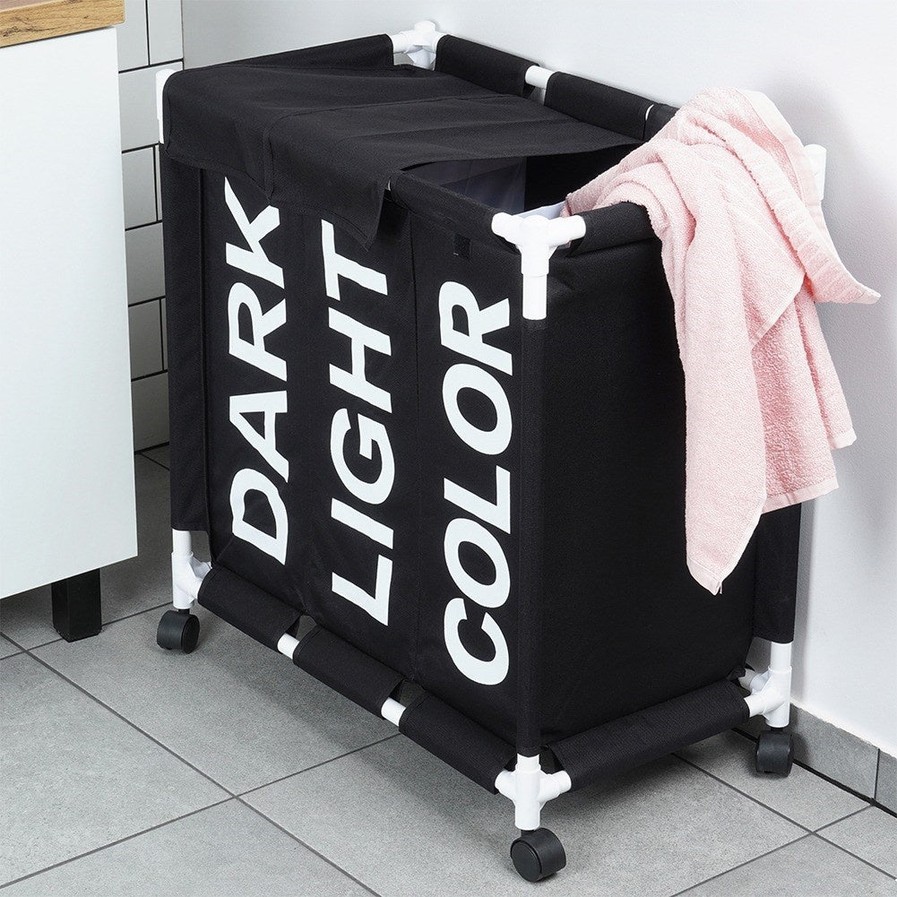 Laundry basket with wheels and three compartments for easy sorting