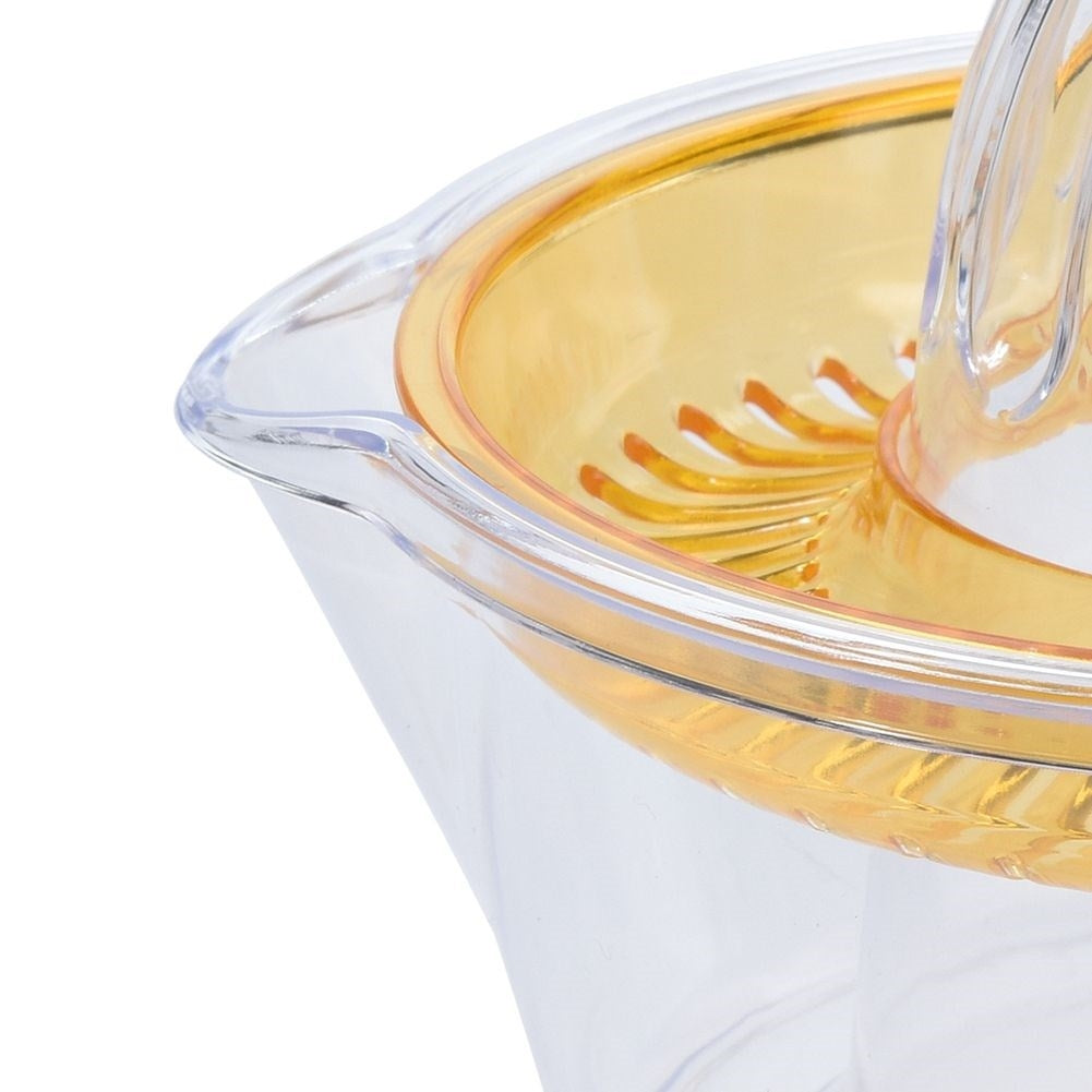 Lemon squeezer with spout for easy juicing