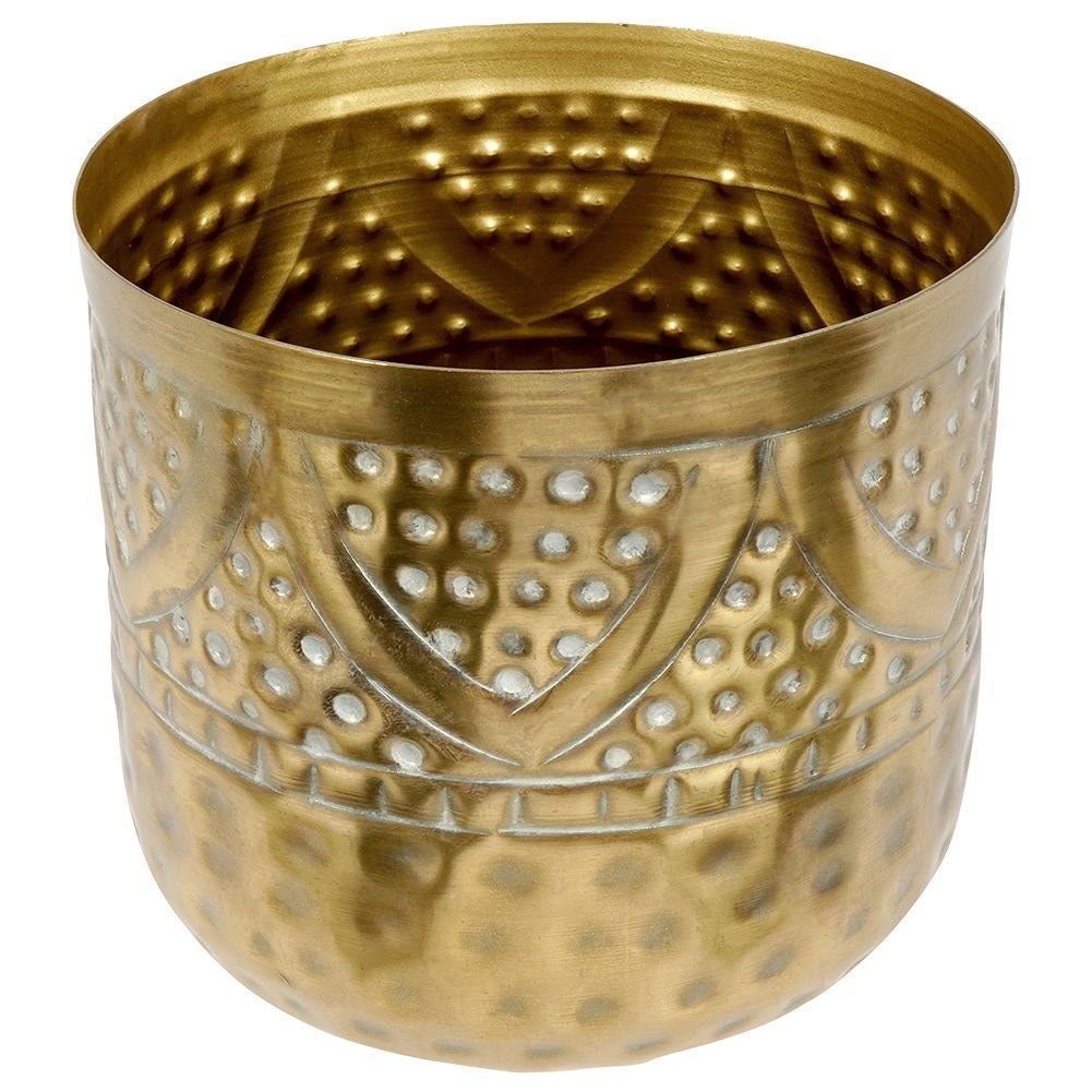 Luxurious flower pot in hammered brass with an elegant design