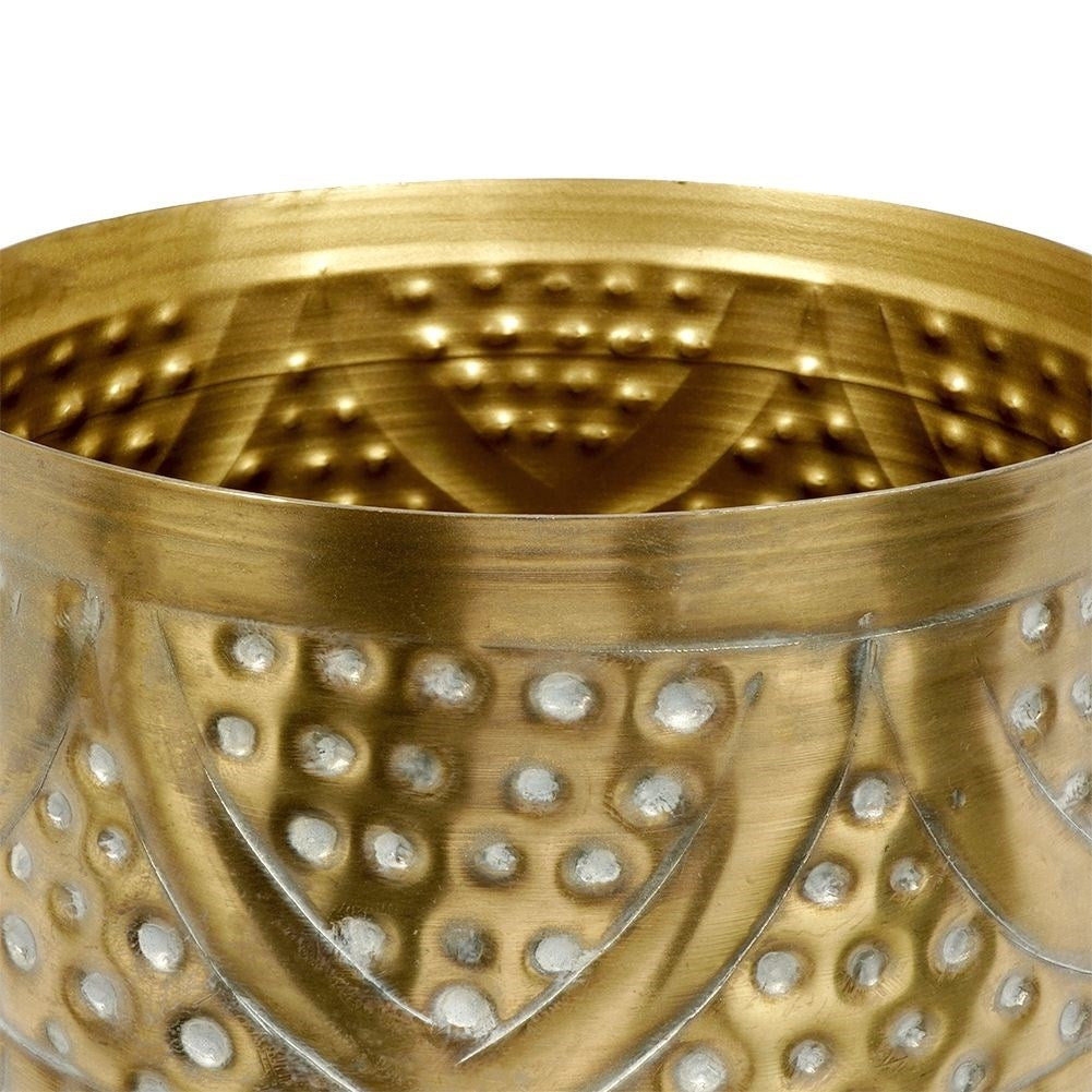 Luxurious flower pot in hammered brass with an elegant design