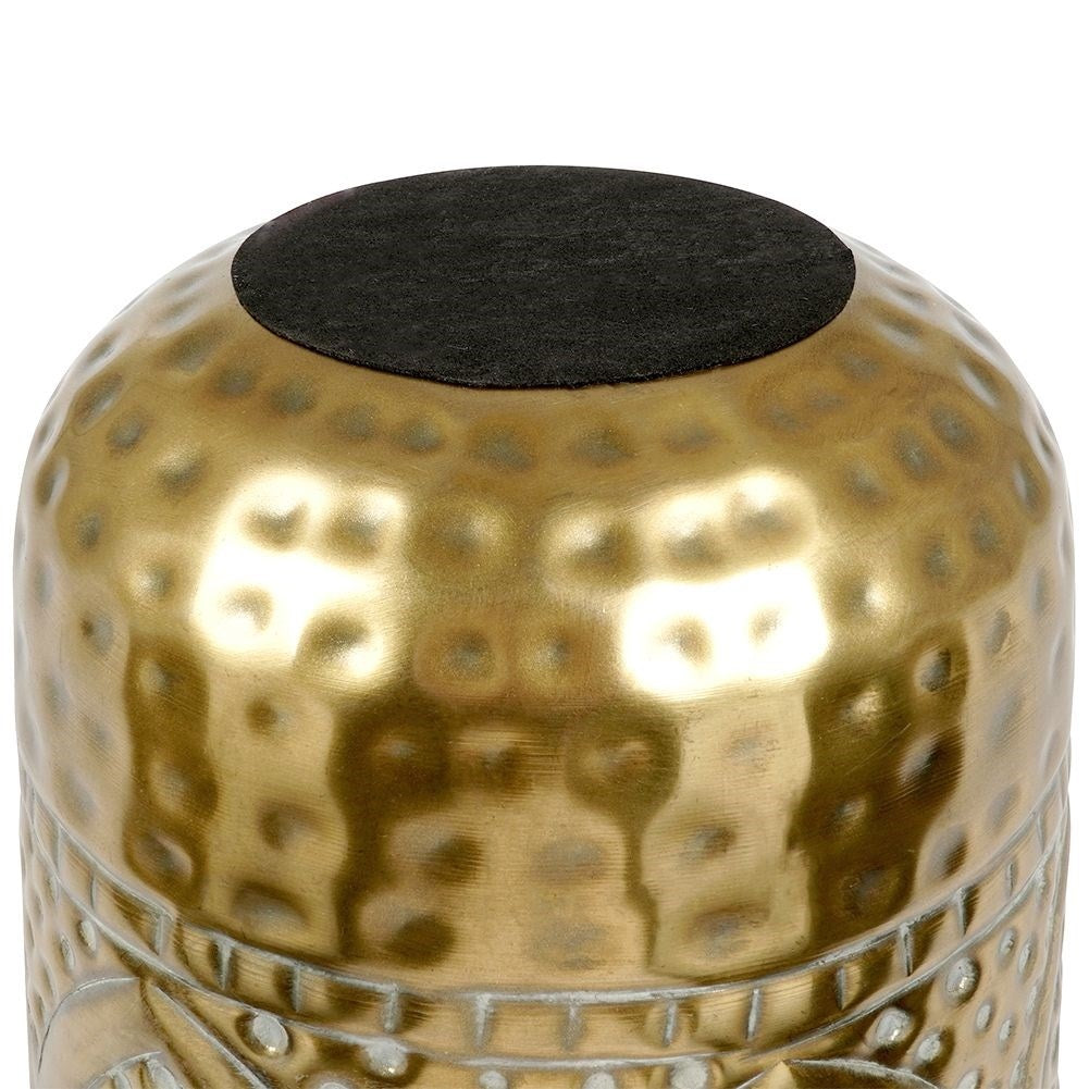Luxurious flower pot in hammered brass with an elegant design