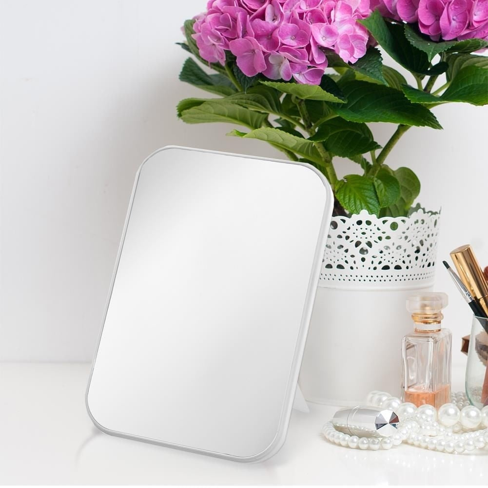 Makeup mirror on stand with white frame for makeup