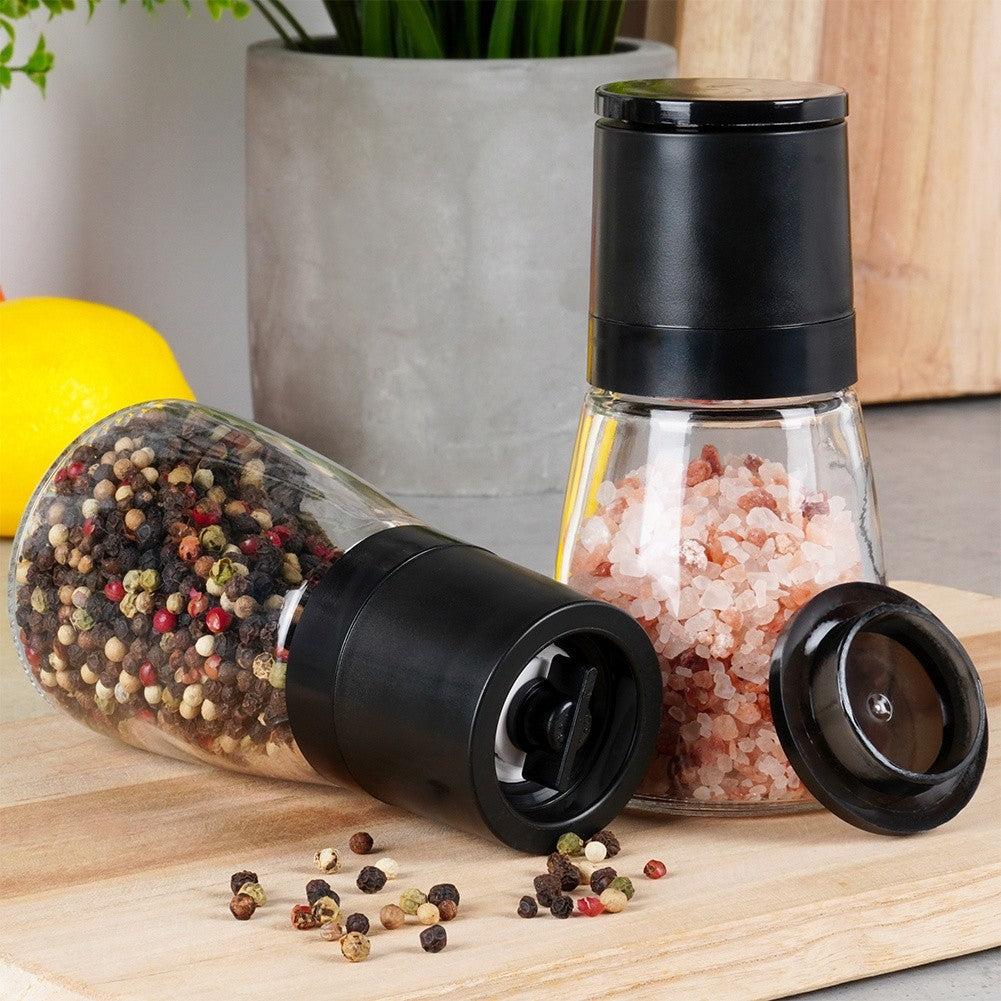 Manual pepper and salt grinders with adjustable grinding degree