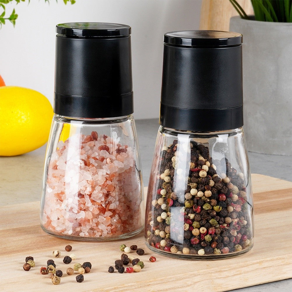 Manual pepper and salt grinders with adjustable grinding degree