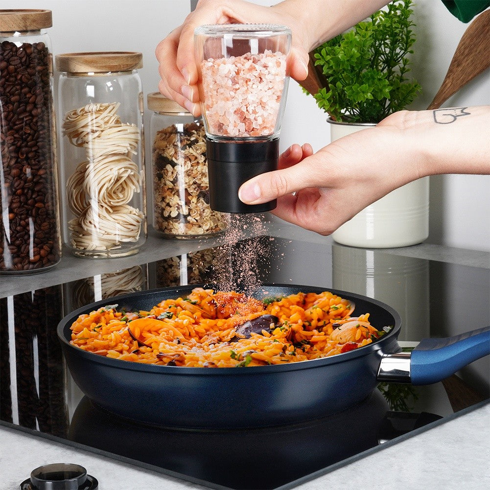 Manual pepper and salt grinders with adjustable grinding degree