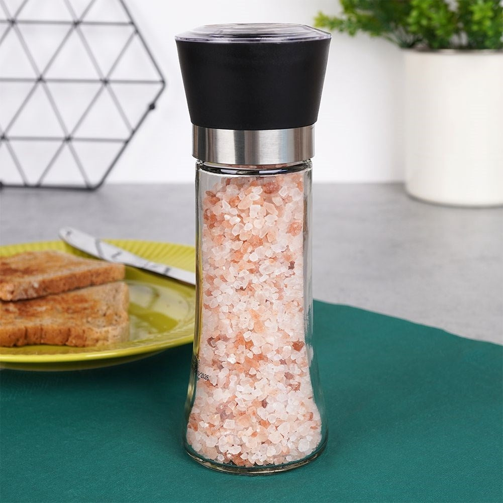 Manual spice grinder with adjustable ceramic grinding
