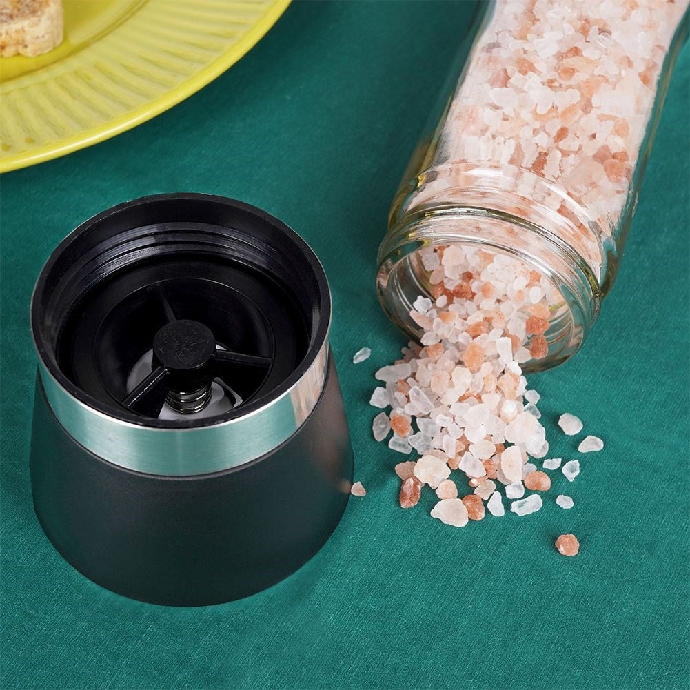 Manual spice grinder with adjustable ceramic grinding