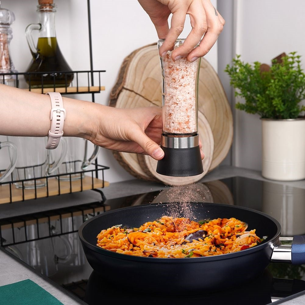 Manual spice grinder with adjustable ceramic grinding