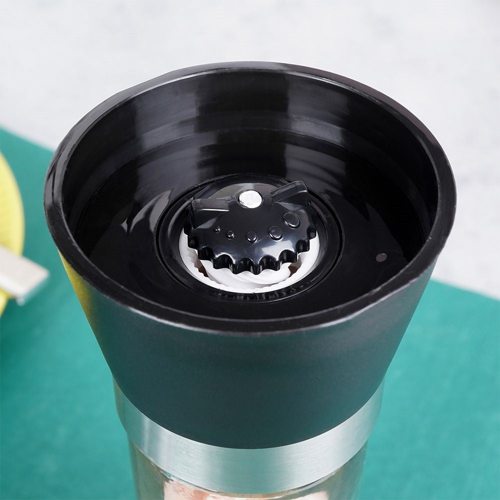 Manual spice grinder with adjustable ceramic grinding