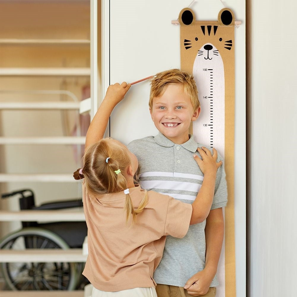 Measuring stick for children in mustard yellow canvas with tiger motif